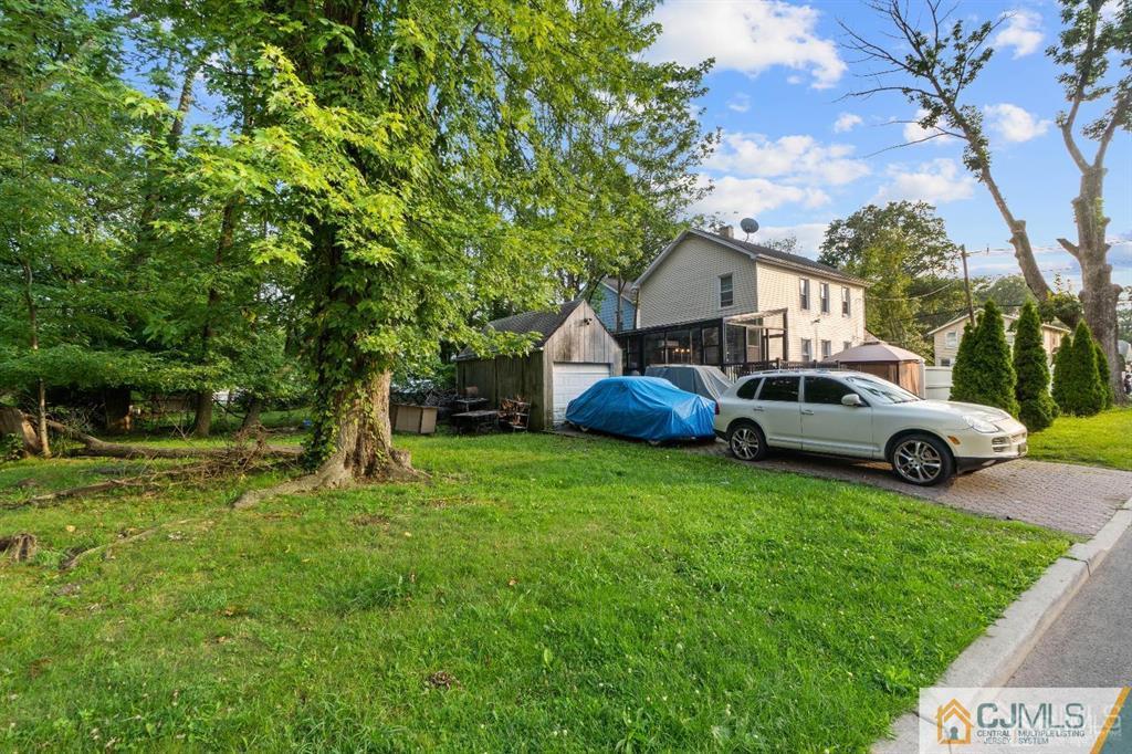701 Spruce Street Roselle, NJ 07203 - Photo 5 of 28 a view of a house with backyard