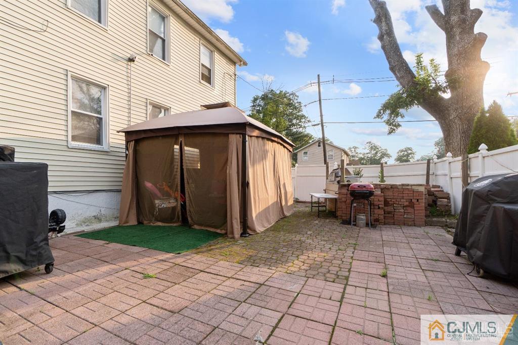 701 Spruce Street Roselle, NJ 07203 - Photo 7 of 28 a view of a back yard of the house