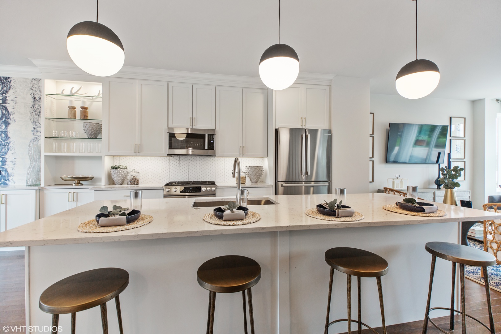 1281 Shermer Road Northbrook, IL 60062 - Photo 6 of 23 a kitchen with a sink a stove cabinets and chairs