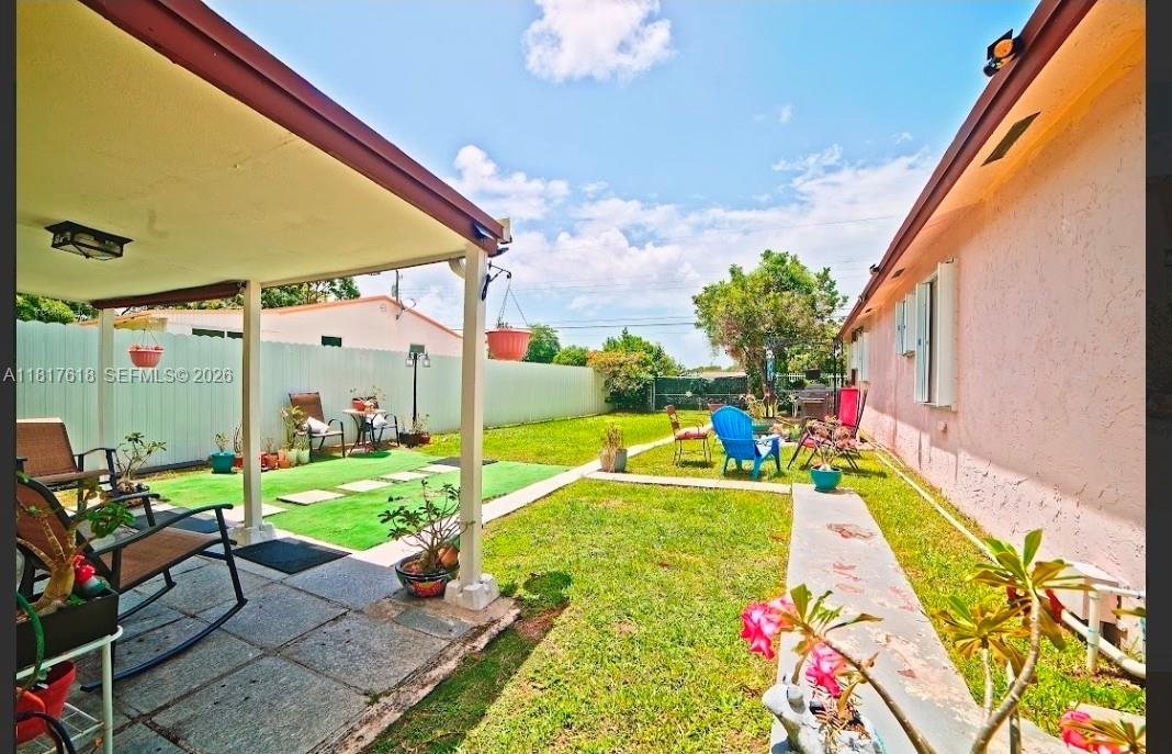 10471 Southwest 174th Terrace Miami, FL 33157 - Photo 13 of 23 a view of backyard with swimming pool