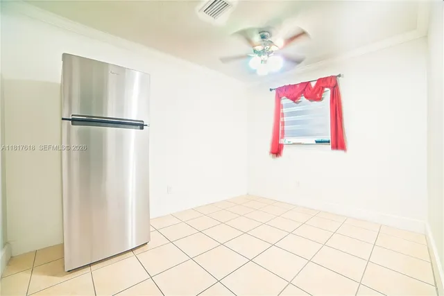 a very nice looking room with a potted plant