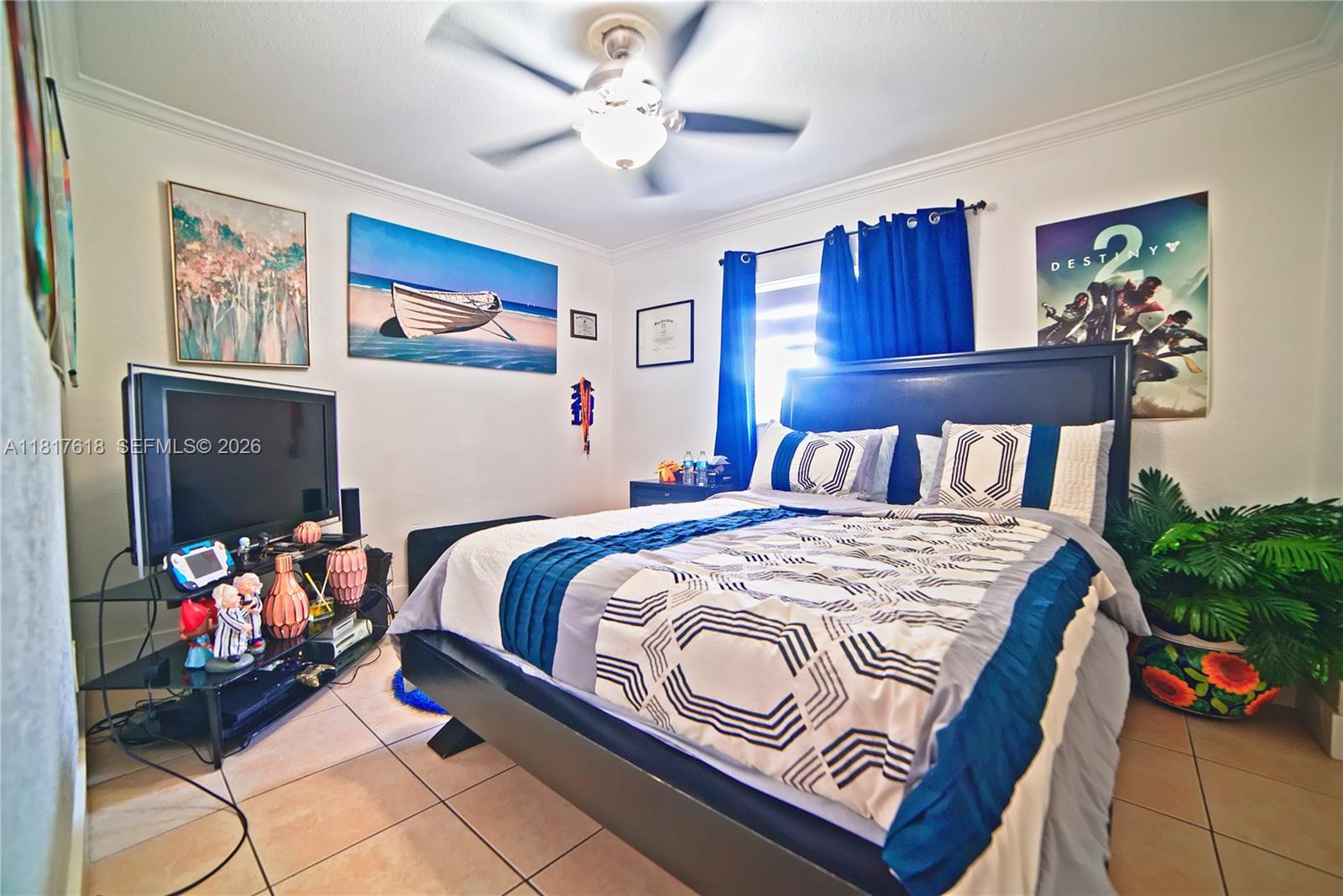 10471 Southwest 174th Terrace Miami, FL 33157 - Photo 20 of 23 a bedroom with a bed and dresser