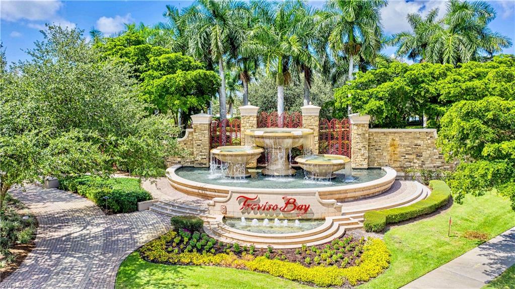9834 Giaveno Circle, Unit 1746 Naples, FL 34113 - Photo 41 of 41 a white and green with mountain view