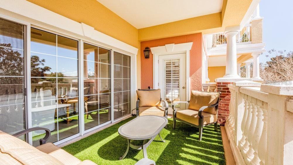 7650 Whisper Way, Unit 304 Reunion, FL 34747 - Photo 21 of 37 a bathroom with a toilet sink and a shower
