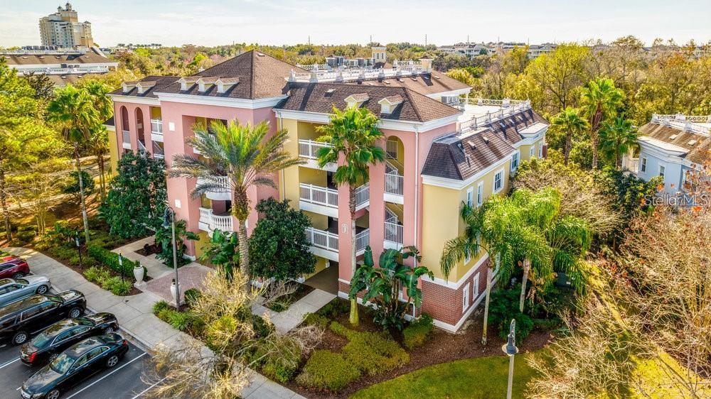 7650 Whisper Way, Unit 304 Reunion, FL 34747 - Photo 23 of 37 a view of a city with tall buildings