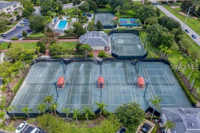 7650 Whisper Way, Unit 304 Reunion, FL 34747 - Photo 30 of 37 an aerial view of a houses with street