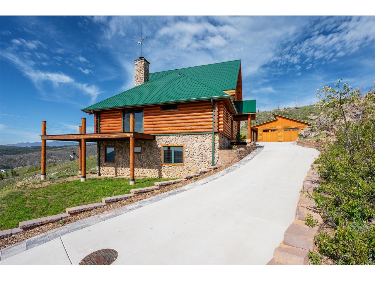 4119 Davis Ranch Road Bellvue, CO 80512 - Photo 3 of 47 Landscaped and concrete driveway for no mess from rain or snow