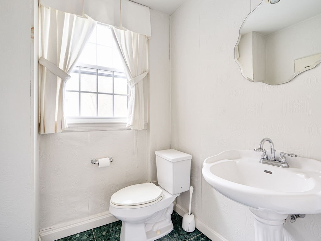 178 Dedham Street Dover, MA 02030 - Photo 11 of 42 a bathroom with a sink and a toilet