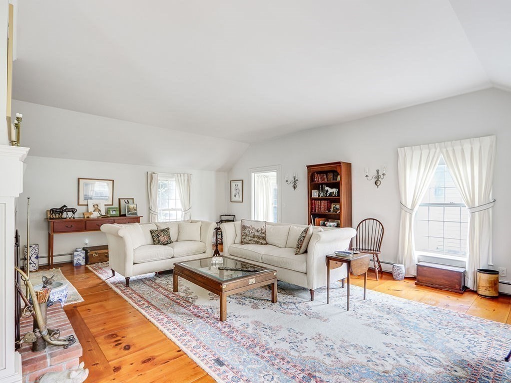 178 Dedham Street Dover, MA 02030 - Photo 14 of 42 a living room with furniture and a wooden floor