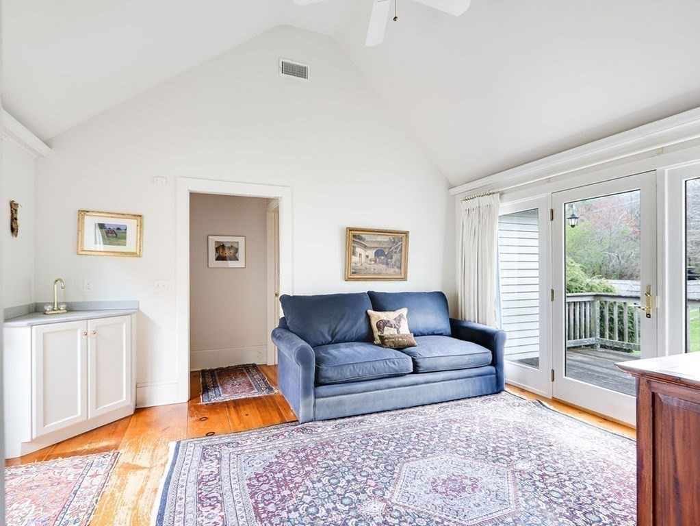 178 Dedham Street Dover, MA 02030 - Photo 15 of 42 a living room with furniture and a large window