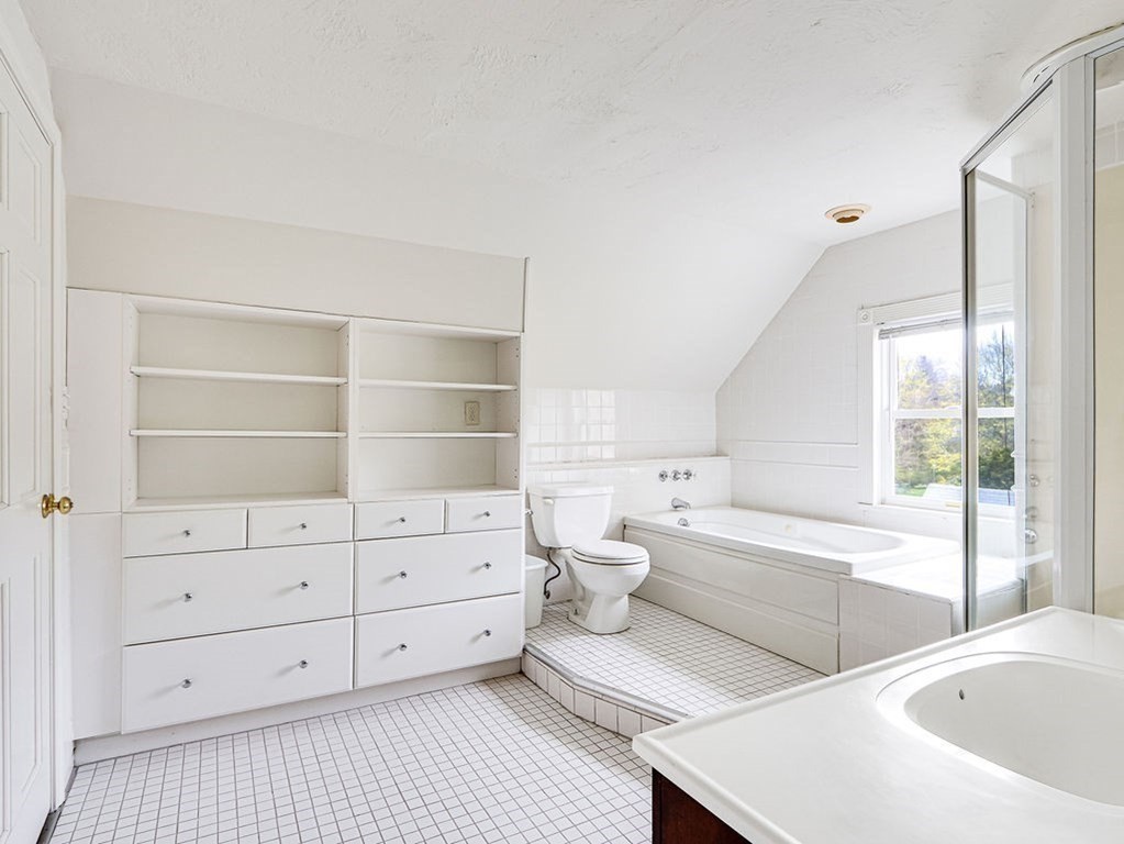 178 Dedham Street Dover, MA 02030 - Photo 29 of 42 a bathroom with a bathtub sink and toilet