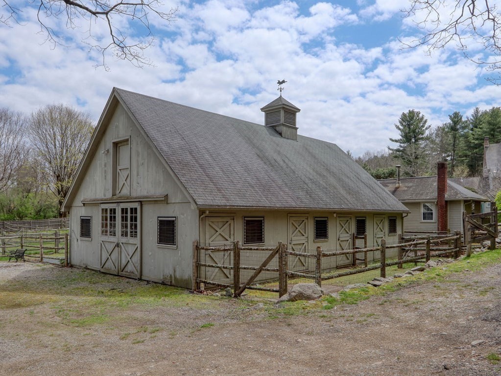 178 Dedham Street Dover, MA 02030 - Photo 3 of 42 a house view with a backyard space