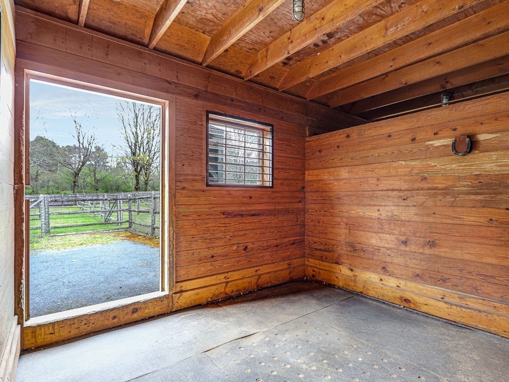 178 Dedham Street Dover, MA 02030 - Photo 37 of 42 a view of a room with wooden walls and windows
