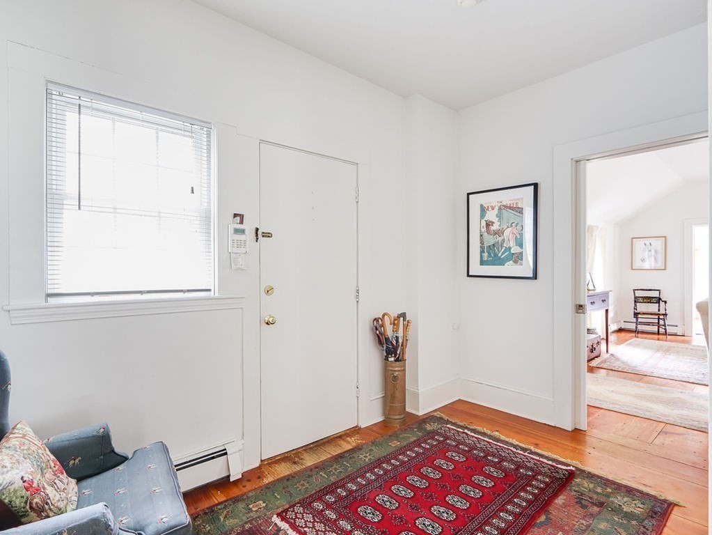 178 Dedham Street Dover, MA 02030 - Photo 6 of 42 a very nice looking room with a rug