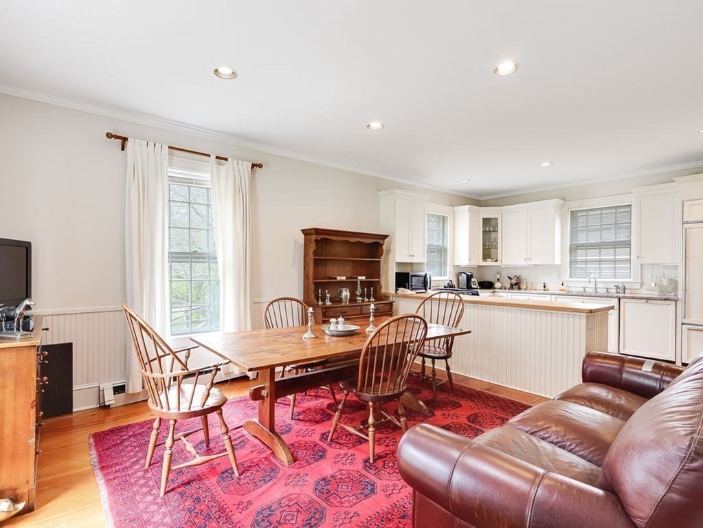 178 Dedham Street Dover, MA 02030 - Photo 9 of 42 a living room with furniture and a flat screen tv