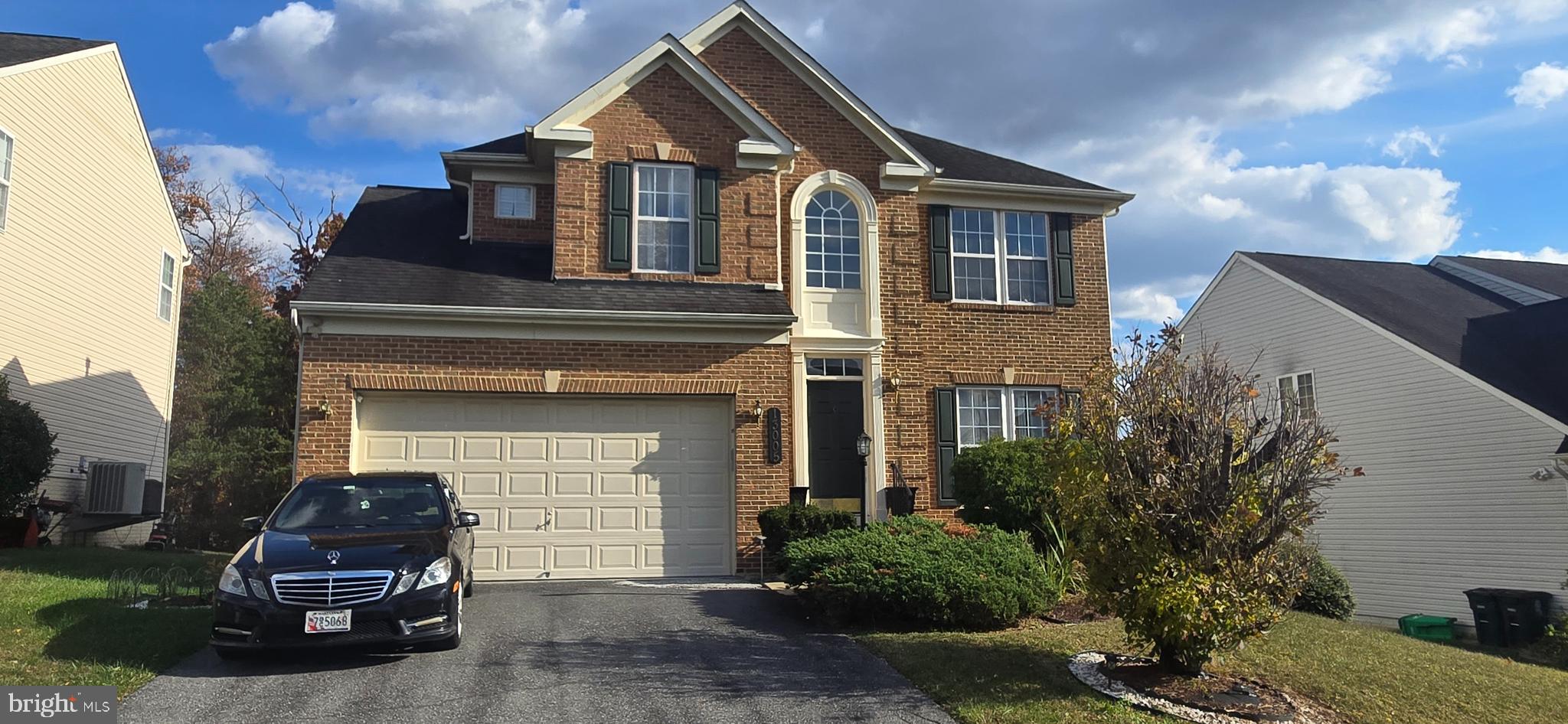 13005 Firestone Court Silver Spring, MD 20904 - Photo 2 of 47 a front view of a house with a yard