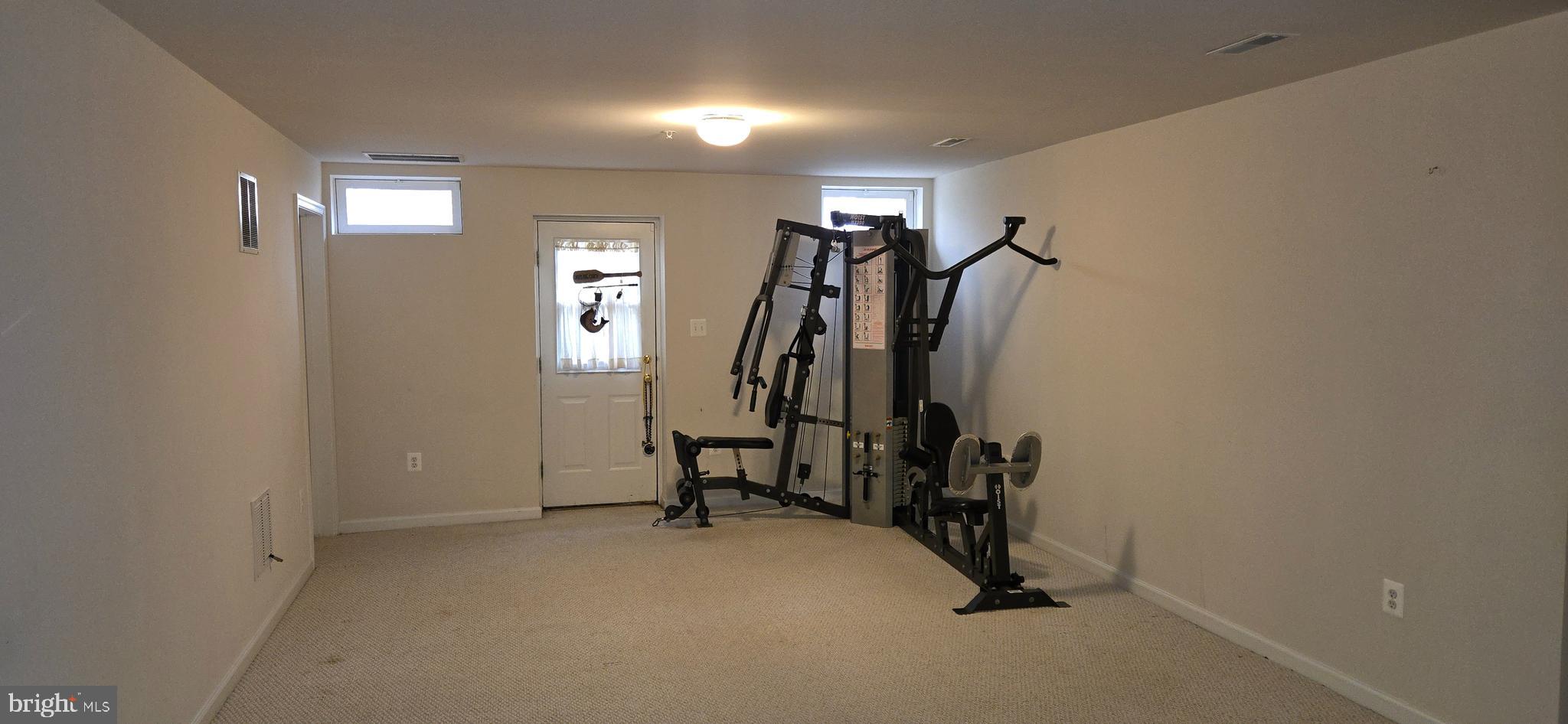 13005 Firestone Court Silver Spring, MD 20904 - Photo 40 of 47 a view of a room with gym equipment