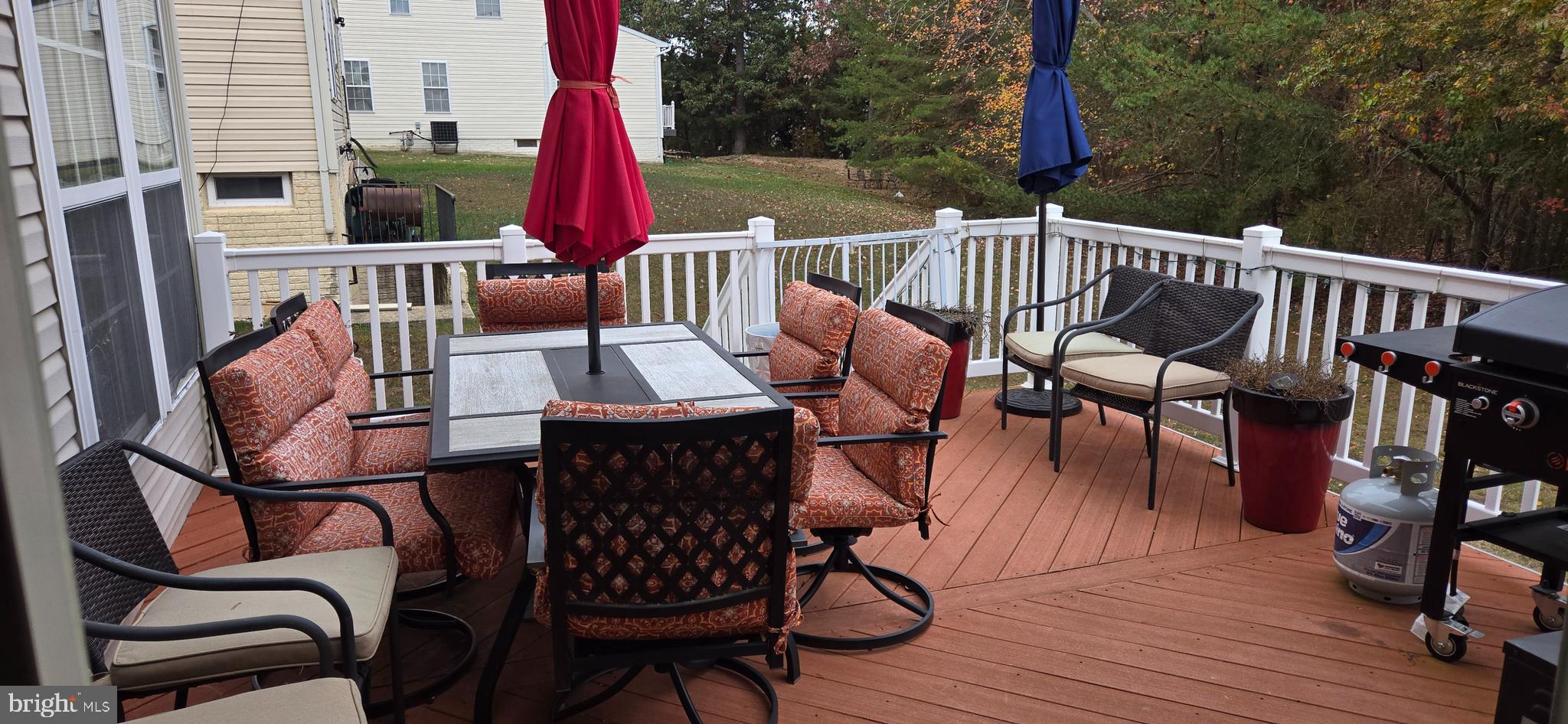 13005 Firestone Court Silver Spring, MD 20904 - Photo 44 of 47 a view of balcony with wooden floor outdoor seating and furniture