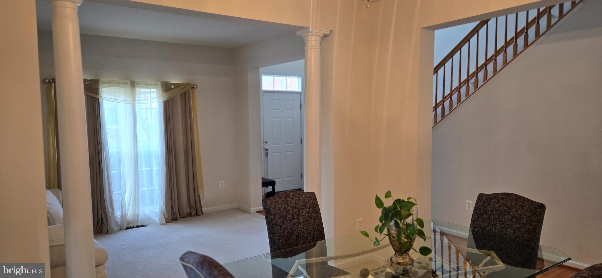 13005 Firestone Court Silver Spring, MD 20904 - Photo 7 of 47 a view of a hallway with workspace and a potted plant