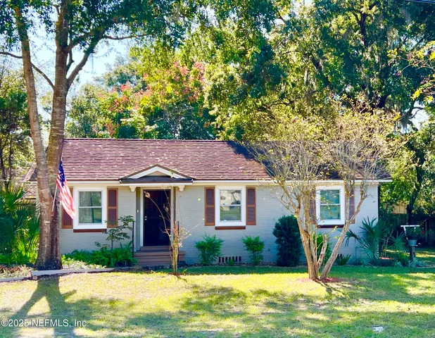 a house view with a garden space
