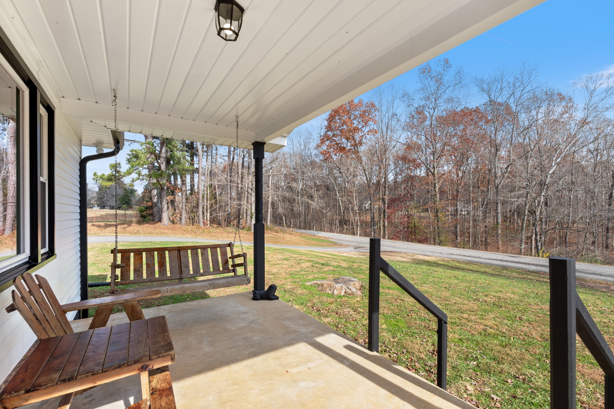 7139 Anderson Road Fairview, TN 37062 - Photo 14 of 26 a view of a porch with furniture and wooden deck