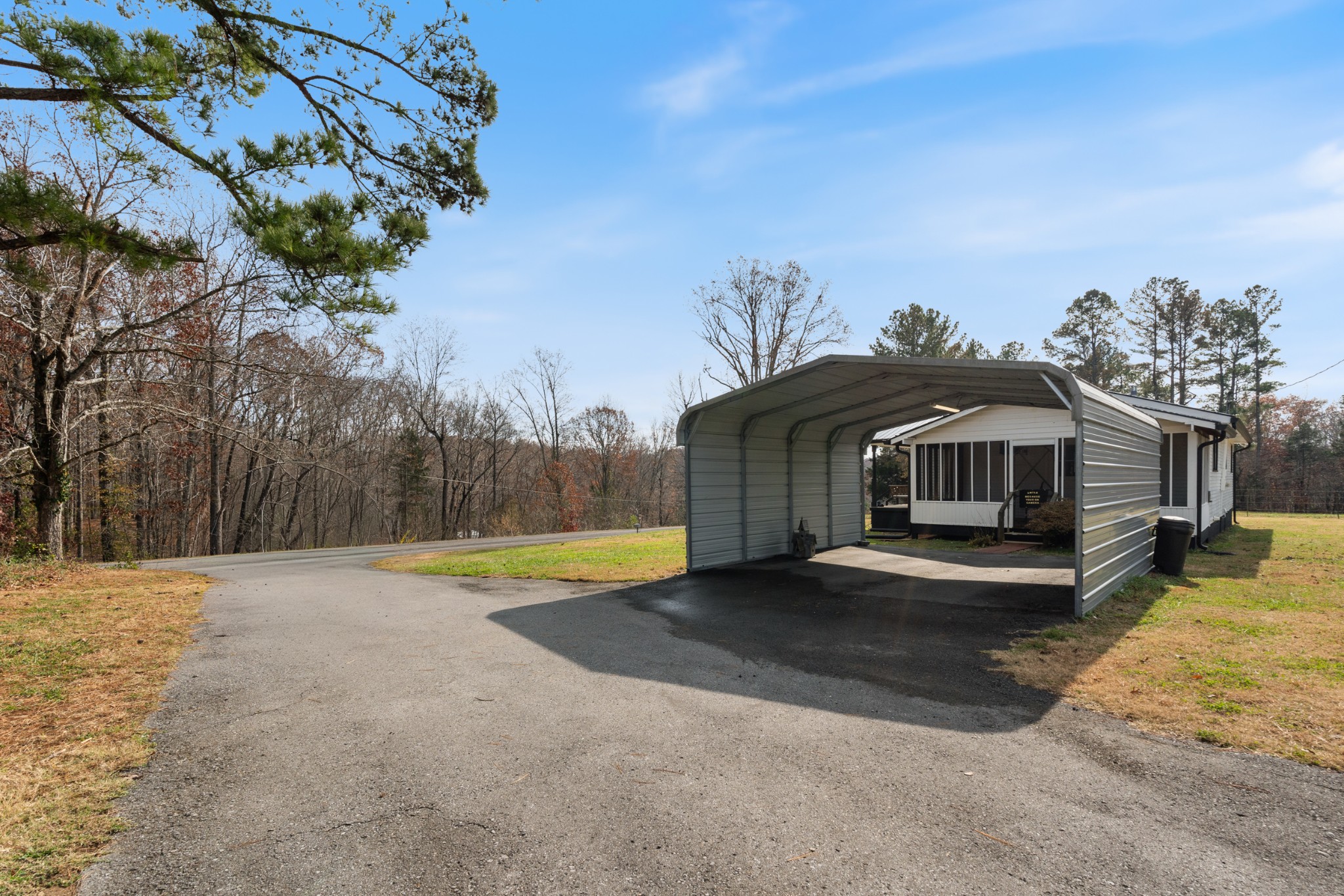 7139 Anderson Road Fairview, TN 37062 - Photo 20 of 26 a view of a house with pool and a yard with seating area