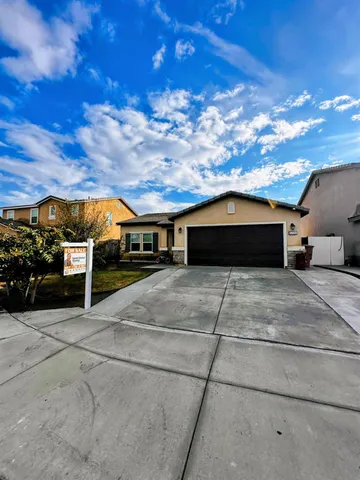 a car parked in front of a house