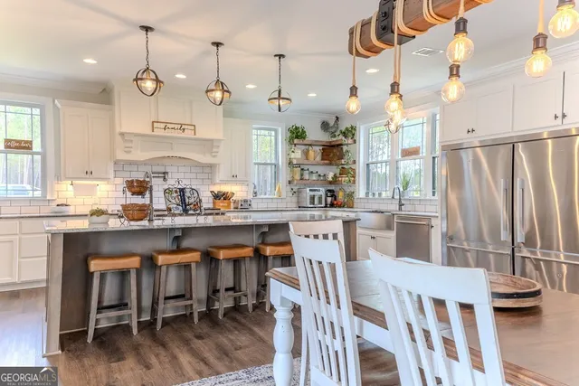 a living room with furniture fireplace and flat screen tv