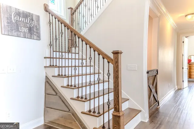 a view of a house with a yard and garden
