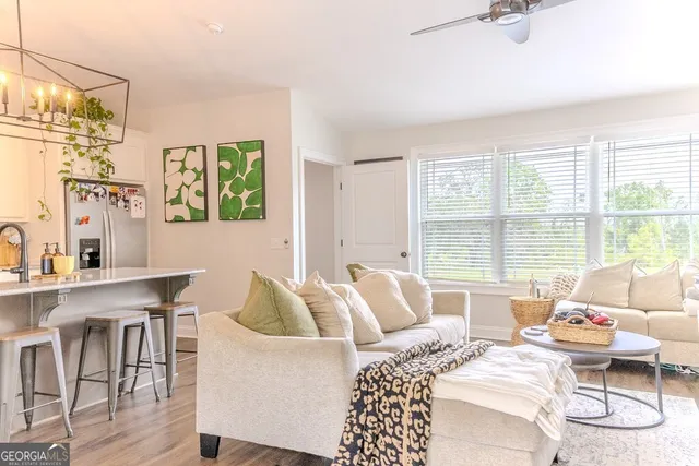 a view of a backyard with sitting area