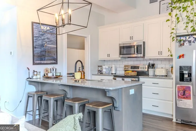 a backyard of a house with lots of trees