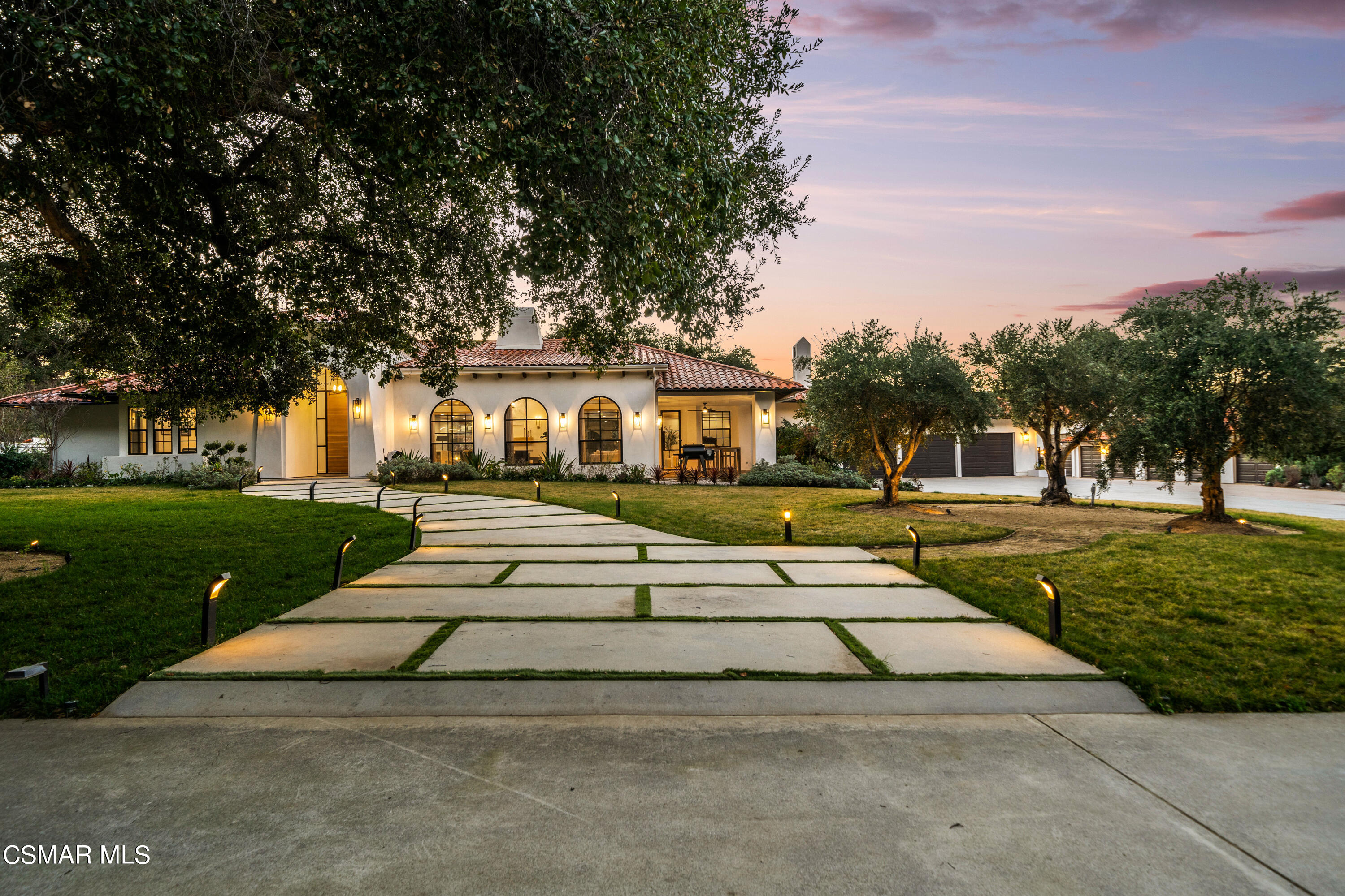 26205 Sand Canyon Road Canyon Country, CA 91387 - Photo 13 of 99 a front view of a house with a yard