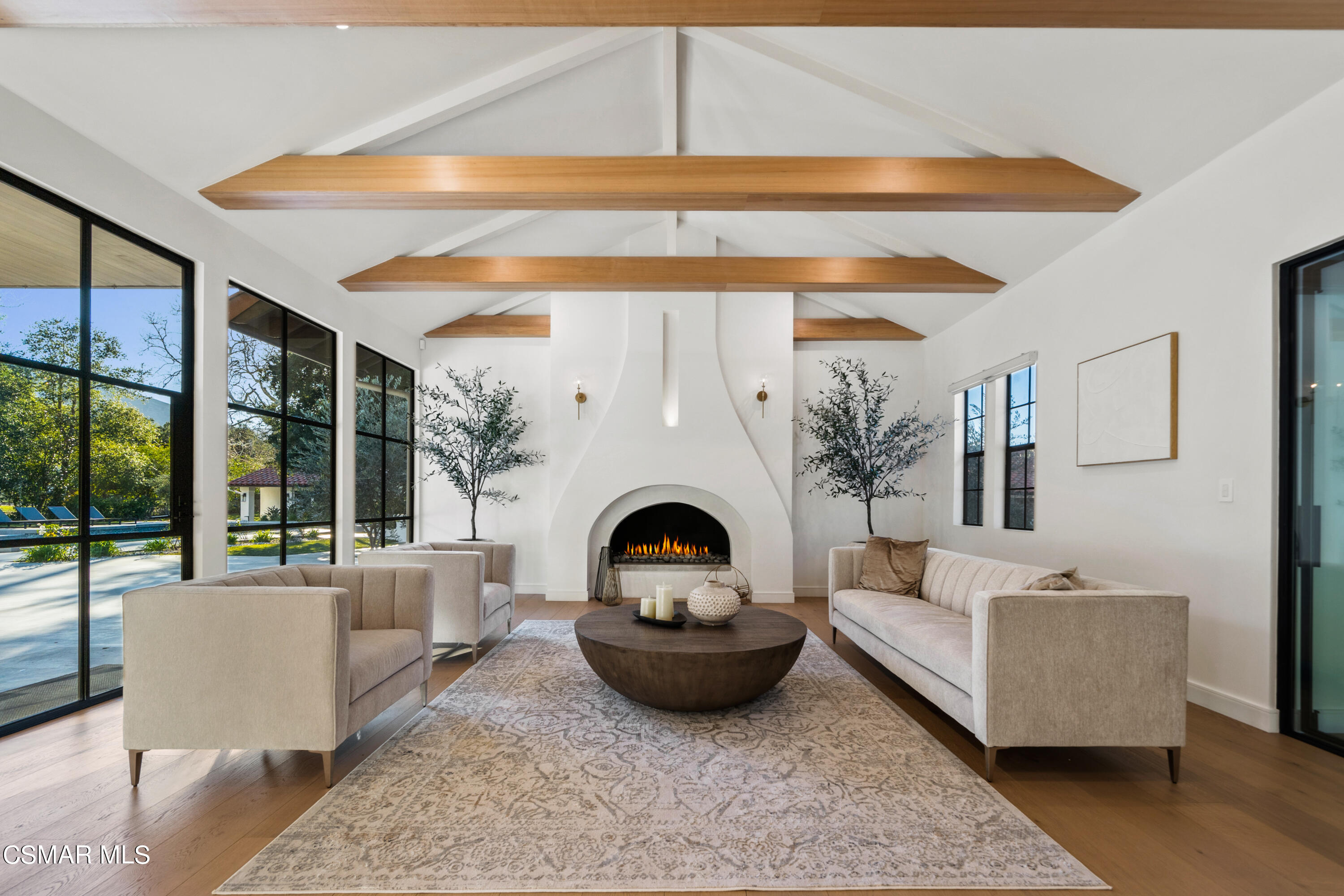 26205 Sand Canyon Road Canyon Country, CA 91387 - Photo 23 of 99 a living room with furniture and a fireplace
