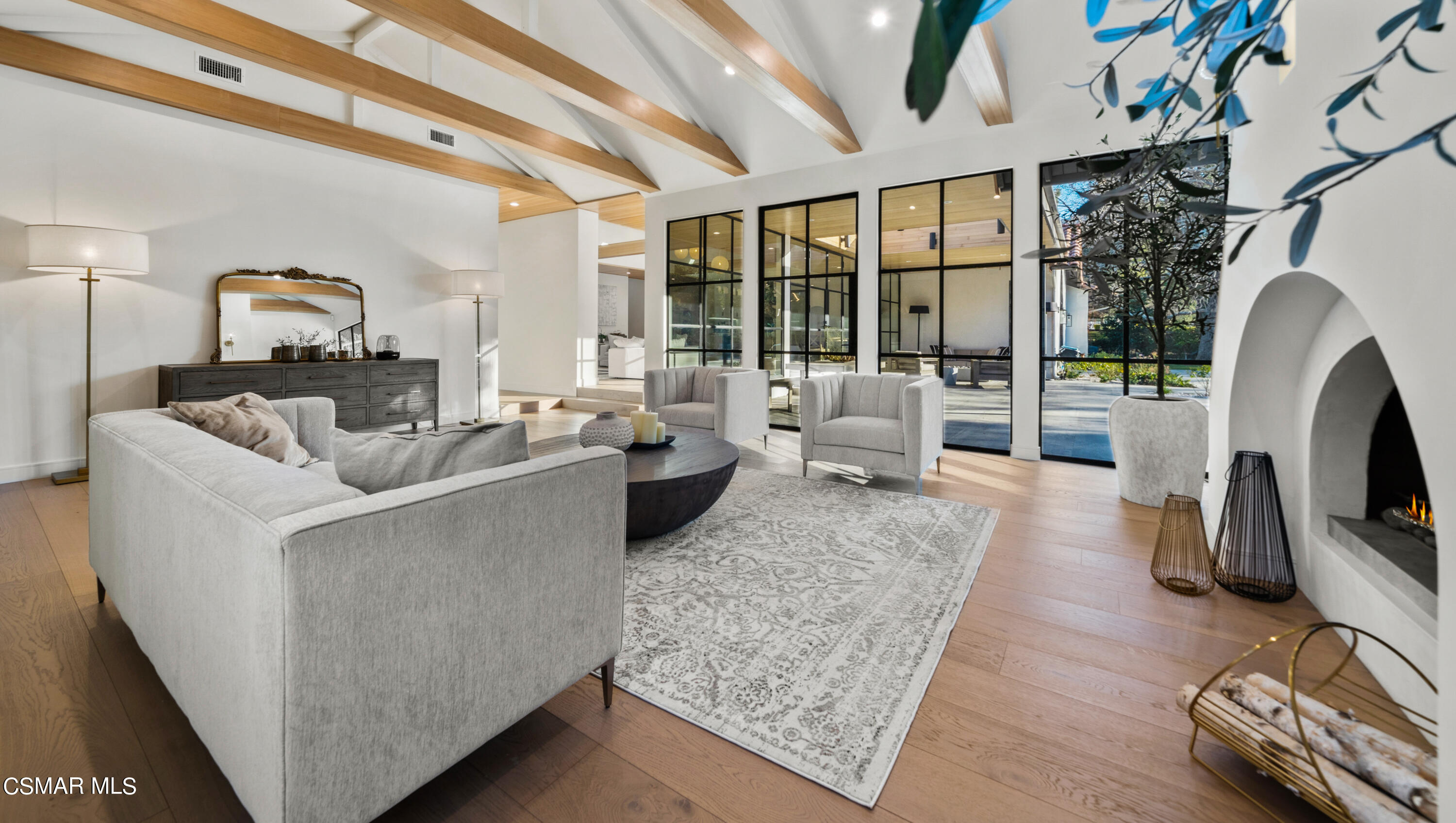 26205 Sand Canyon Road Canyon Country, CA 91387 - Photo 25 of 99 a living room with furniture a large window and a fireplace
