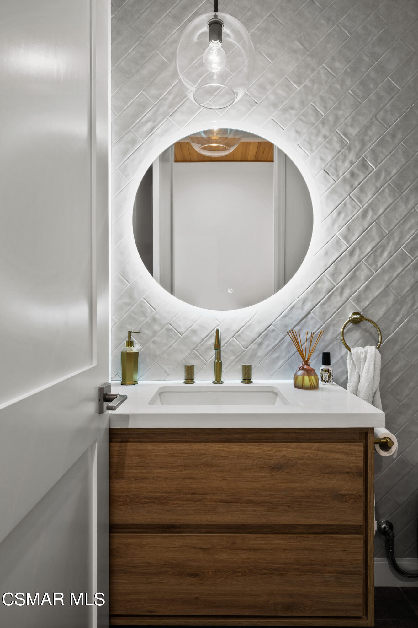 26205 Sand Canyon Road Canyon Country, CA 91387 - Photo 39 of 99 a bathroom with a sink and a mirror
