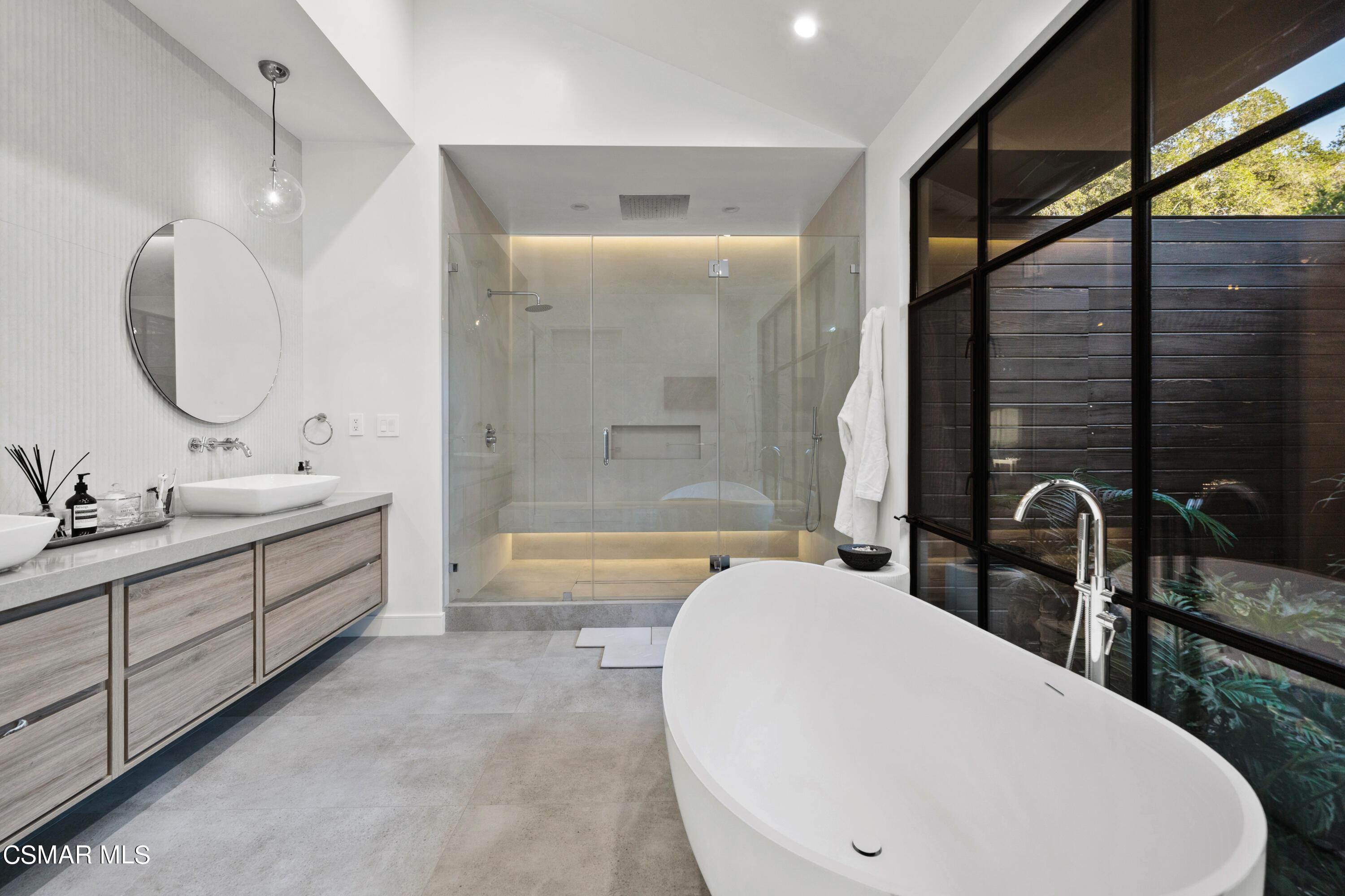 26205 Sand Canyon Road Canyon Country, CA 91387 - Photo 45 of 99 a bathroom with a double vanity sink a toilet a mirror and bathtub