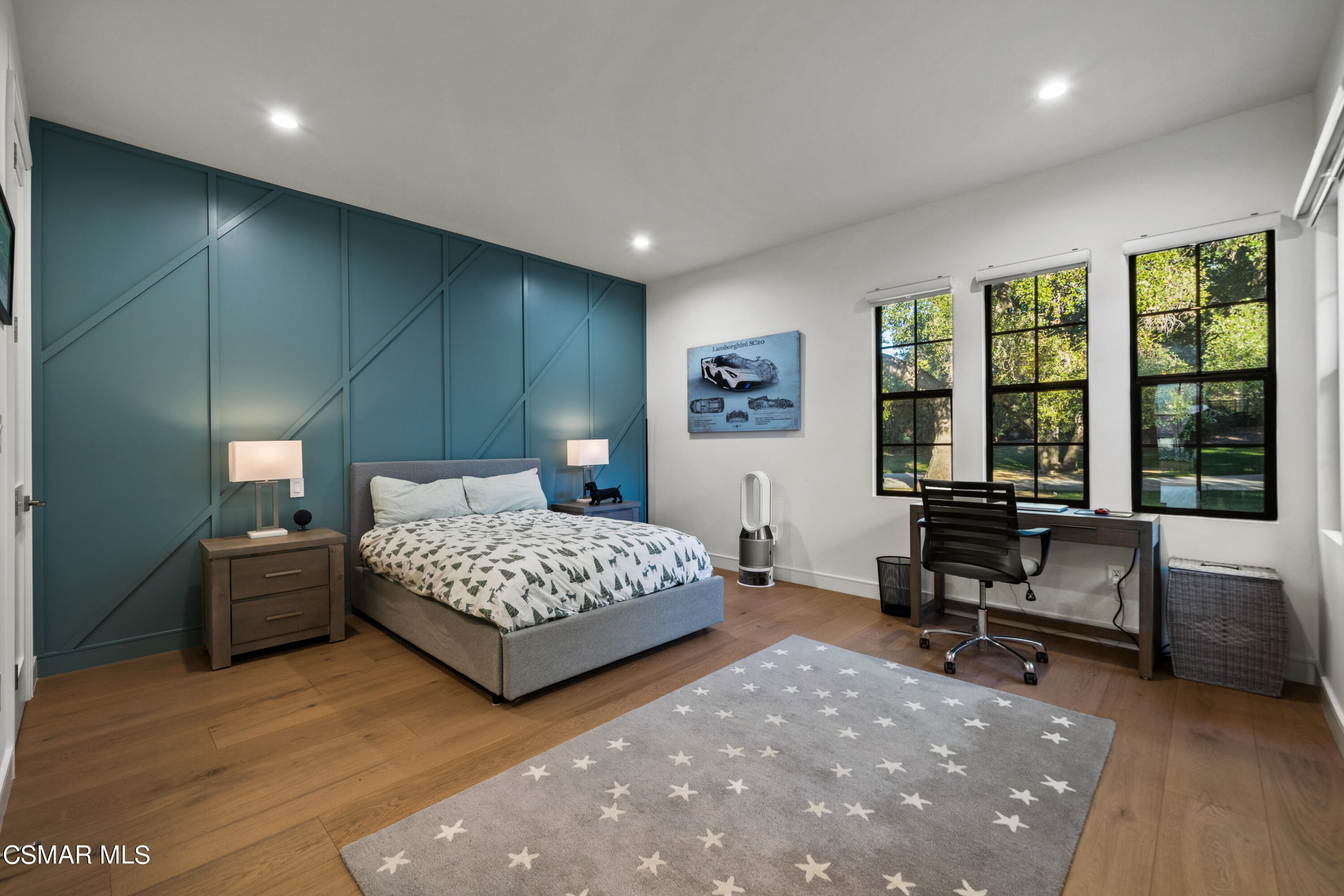 26205 Sand Canyon Road Canyon Country, CA 91387 - Photo 52 of 99 a bedroom with a bed window and a table in it