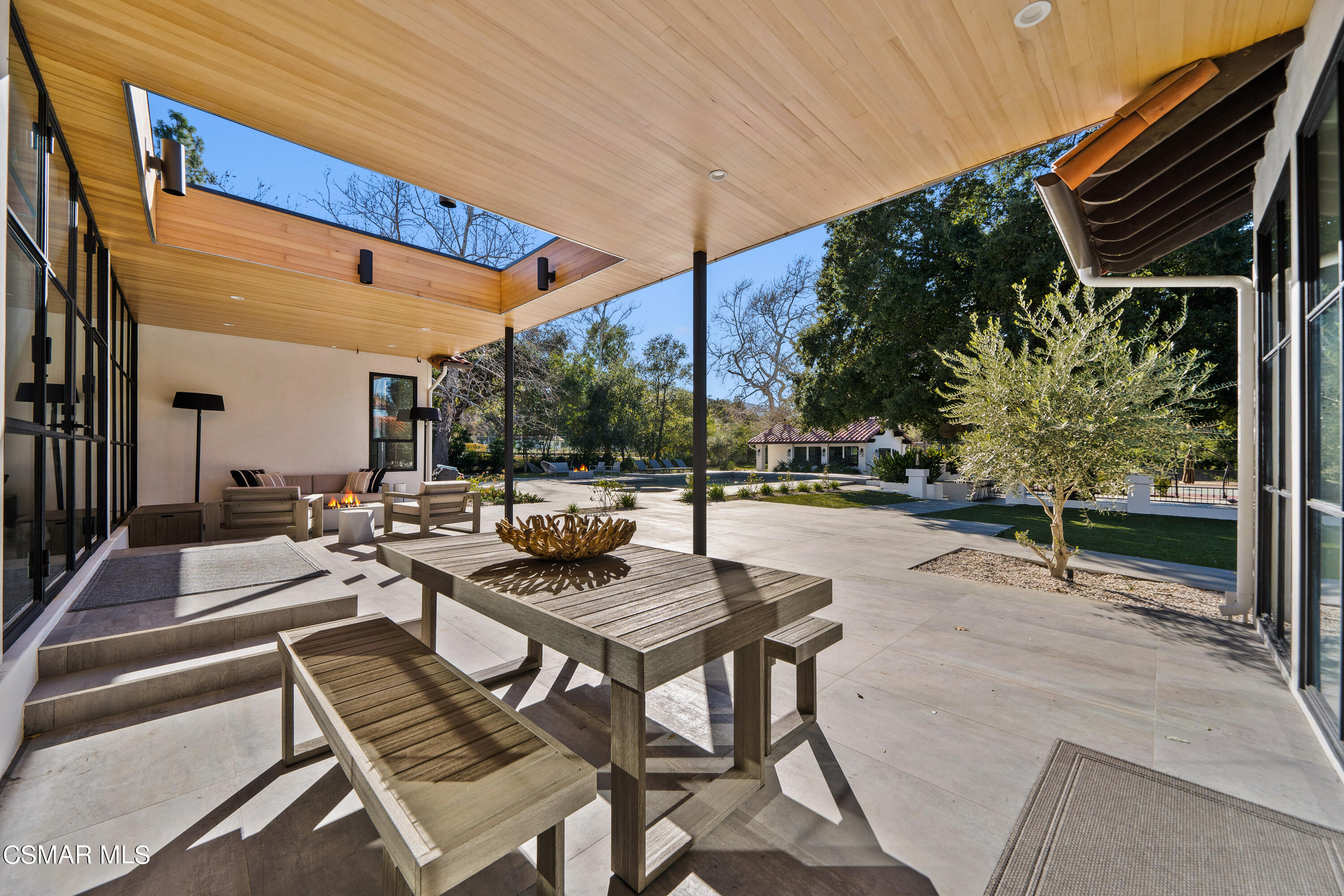 26205 Sand Canyon Road Canyon Country, CA 91387 - Photo 55 of 99 a view of a patio with a table and chairs