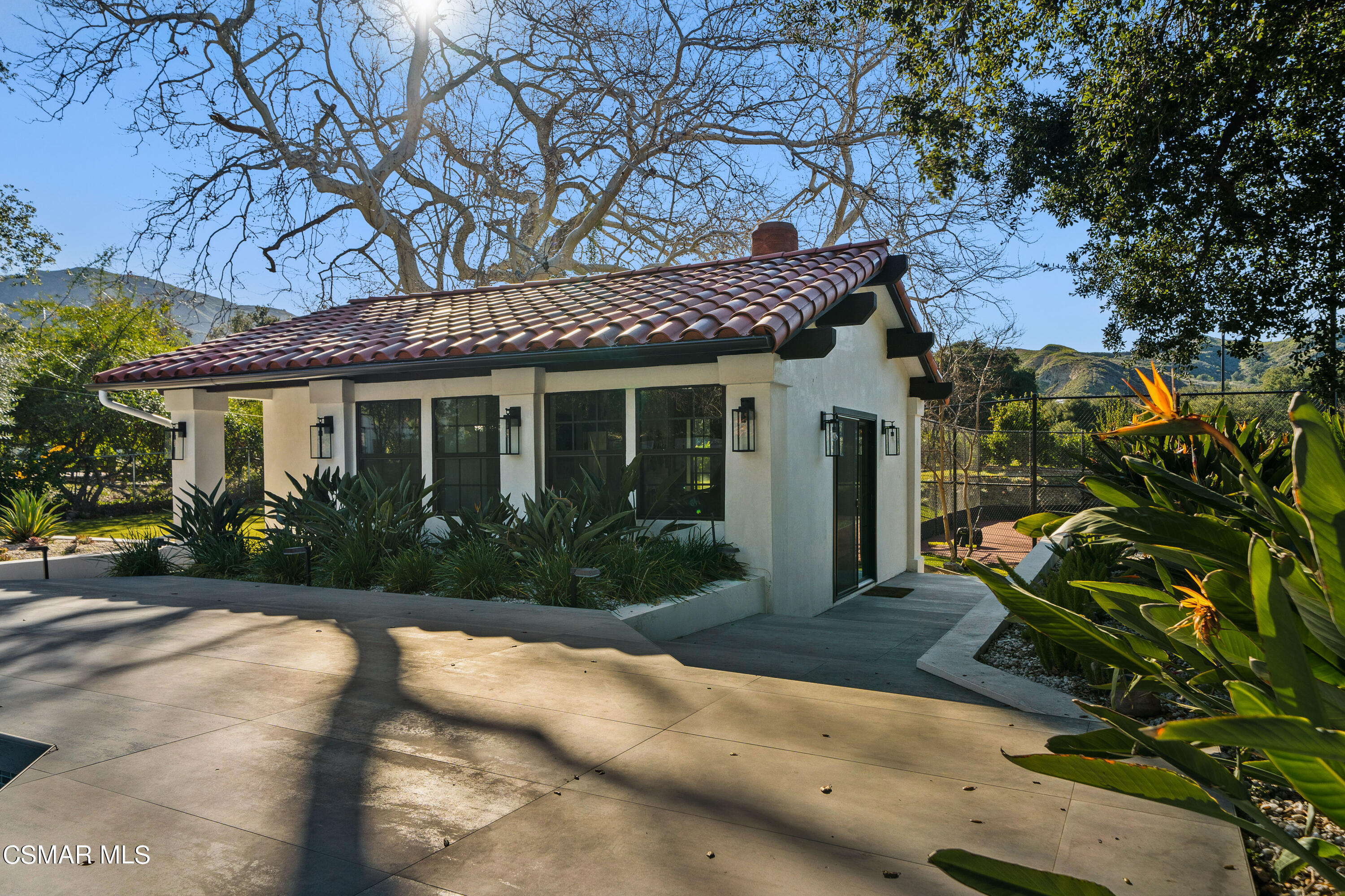 26205 Sand Canyon Road Canyon Country, CA 91387 - Photo 64 of 99 a front view of a house with garden