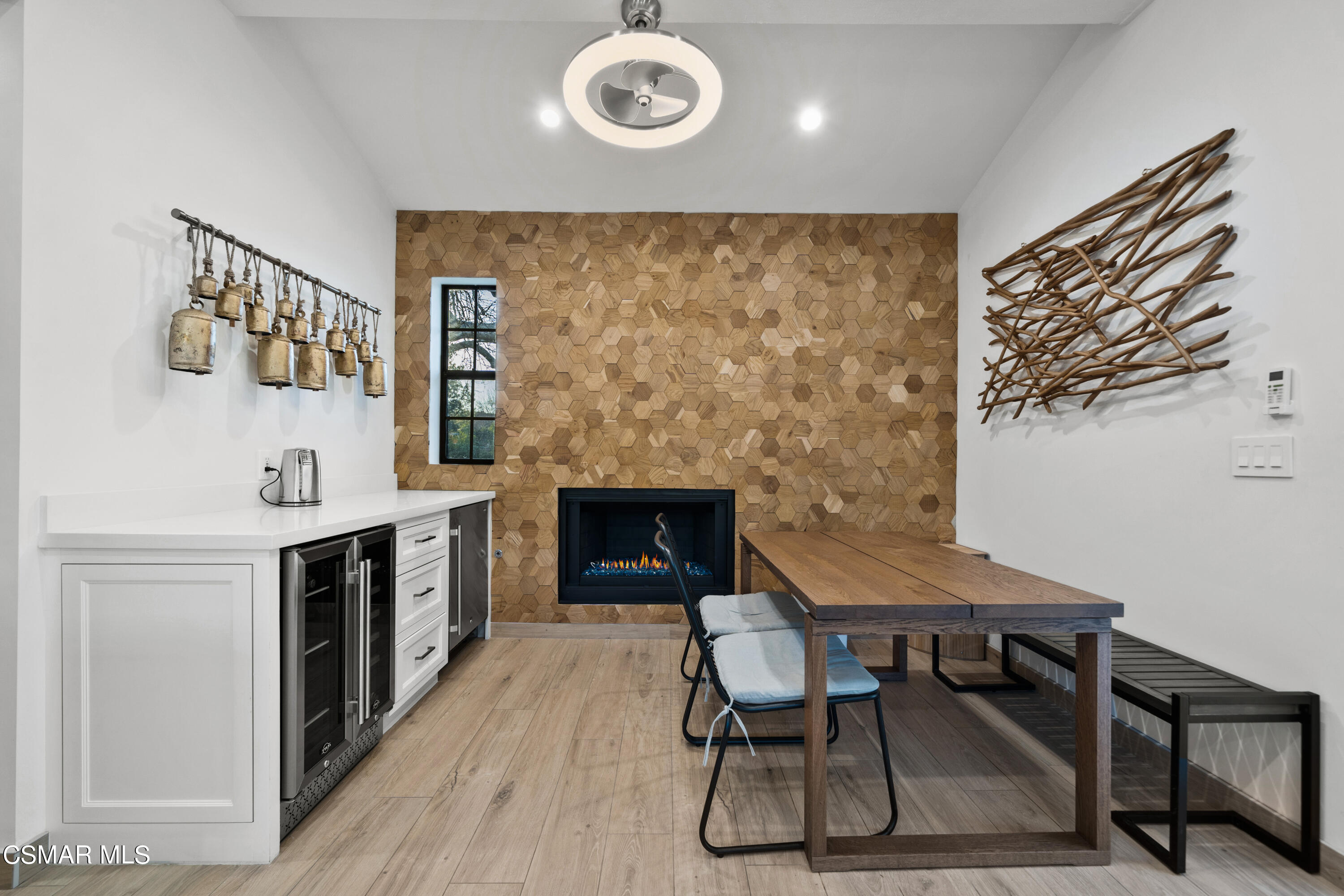 26205 Sand Canyon Road Canyon Country, CA 91387 - Photo 68 of 99 a view of a dining room with furniture and a fireplace