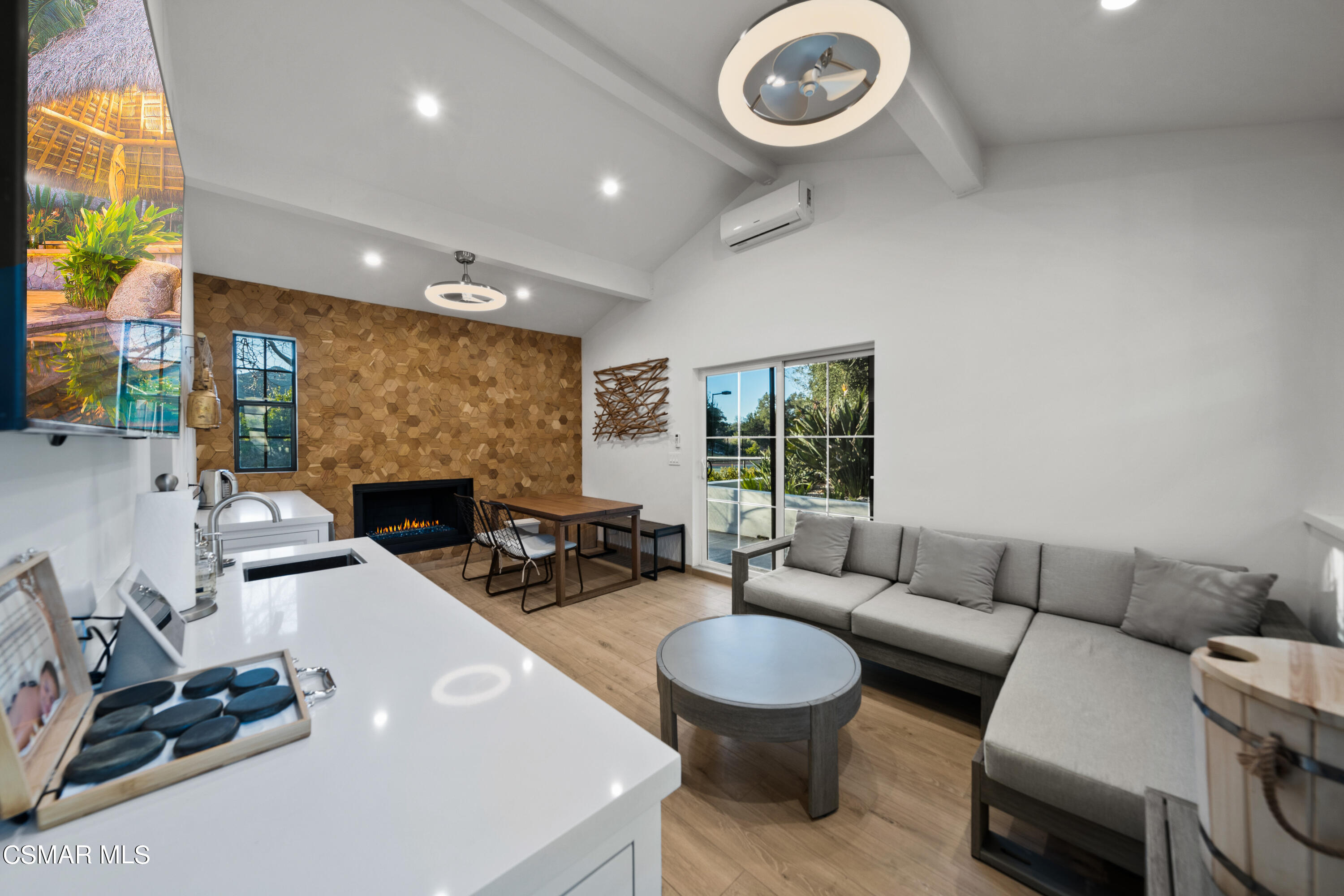 26205 Sand Canyon Road Canyon Country, CA 91387 - Photo 69 of 99 a living room with furniture a fireplace and a large window