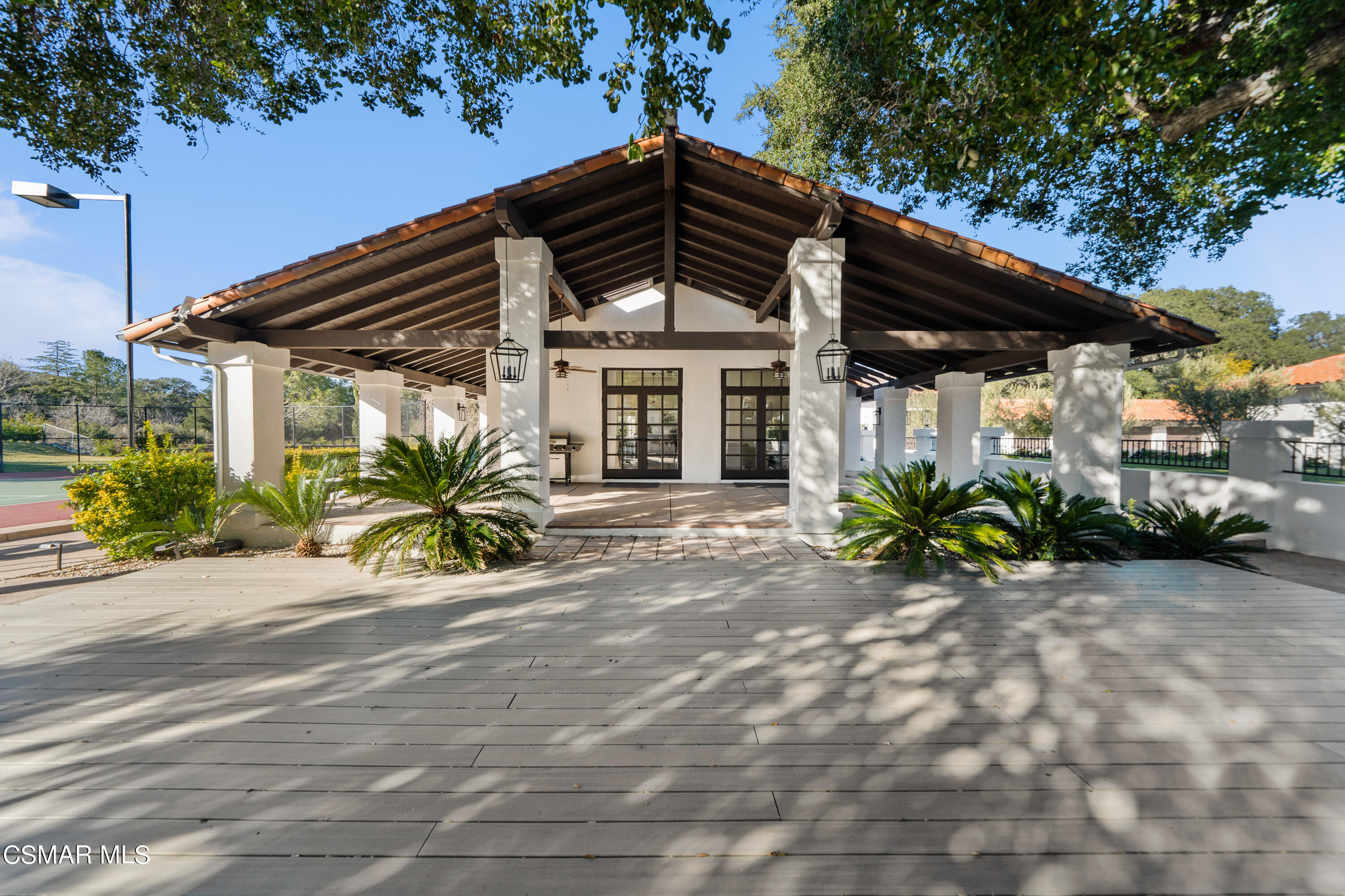 26205 Sand Canyon Road Canyon Country, CA 91387 - Photo 79 of 99 a view of a house with a small yard and potted plants
