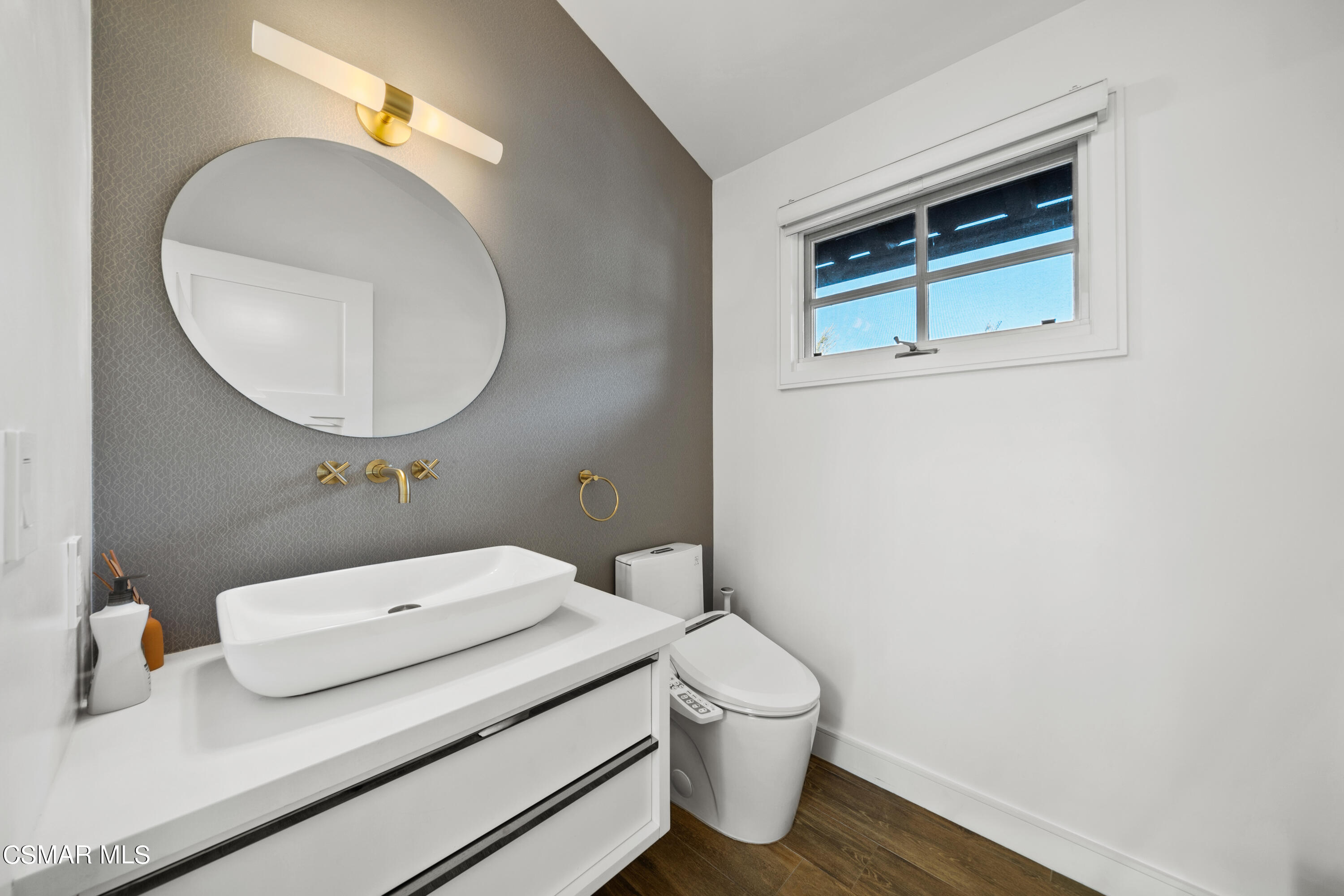 26205 Sand Canyon Road Canyon Country, CA 91387 - Photo 87 of 99 a bathroom with a sink and a mirror