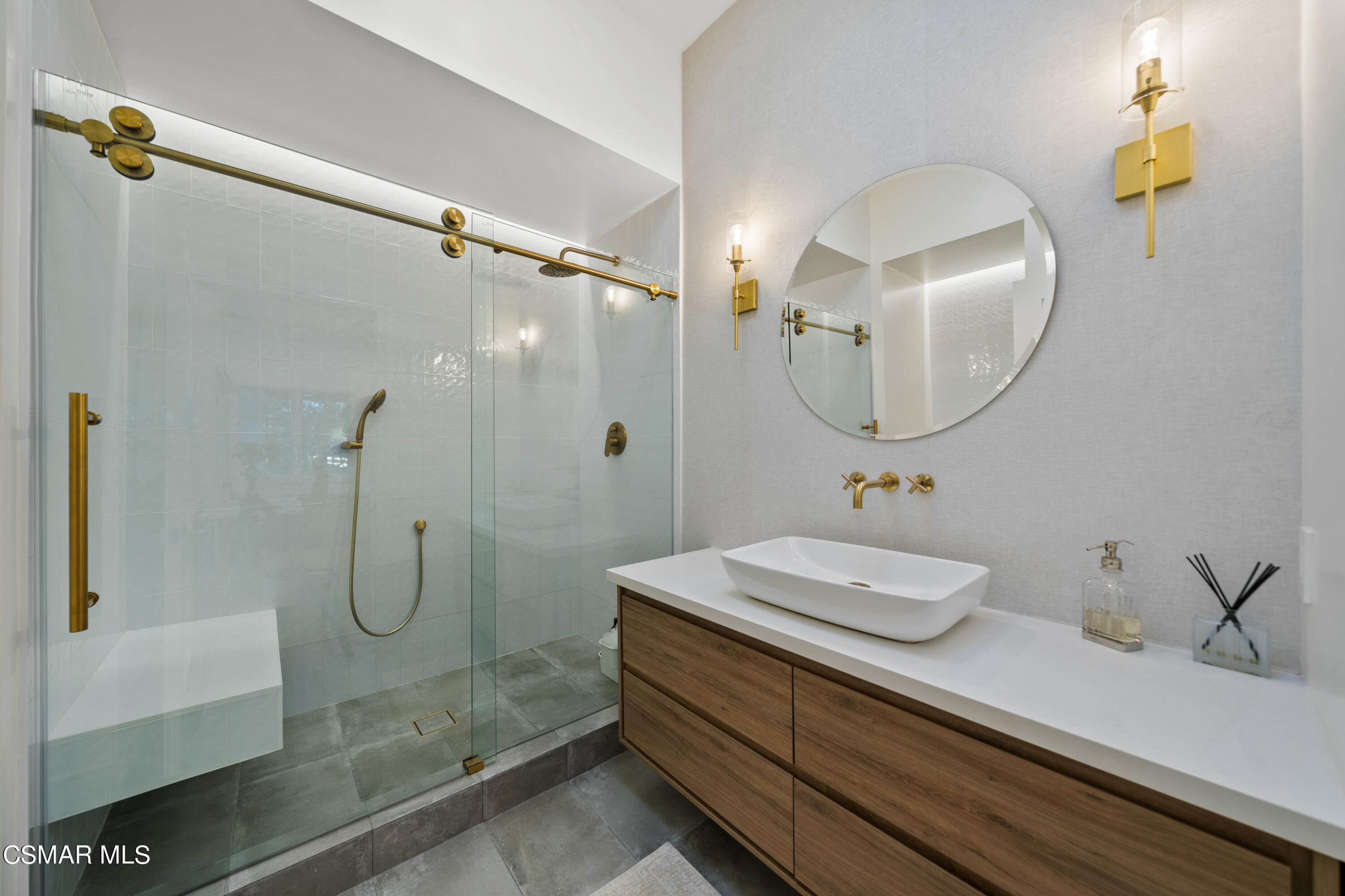 26205 Sand Canyon Road Canyon Country, CA 91387 - Photo 90 of 99 a bathroom with a sink a mirror a glass door and shower
