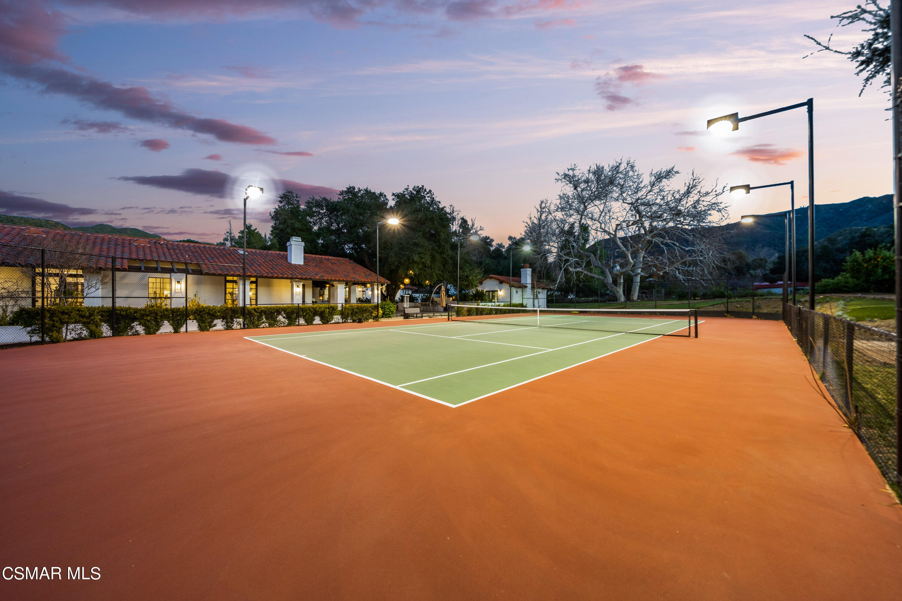 26205 Sand Canyon Road Canyon Country, CA 91387 - Photo 94 of 99 a view of a tennis ground with large trees