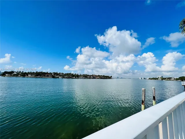 a view of a lake from a balcony