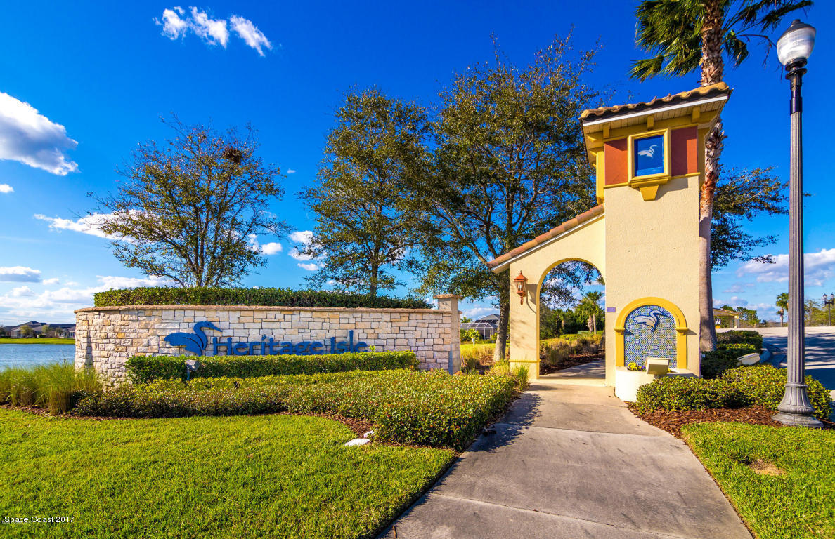 7160 Ralston Street Melbourne, FL 32940 - Photo 11 of 21 Entrance sidewalk to Heritage Isle