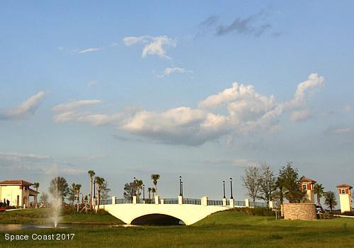 7160 Ralston Street Melbourne, FL 32940 - Photo 12 of 21 entrance bridge and fountain