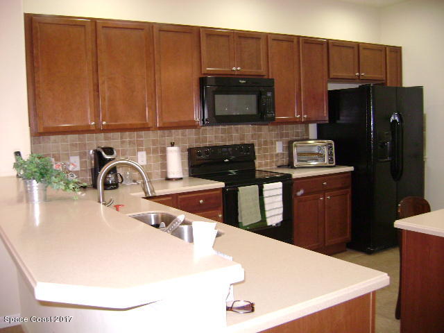 7160 Ralston Street Melbourne, FL 32940 - Photo 3 of 21 bar-kitchen