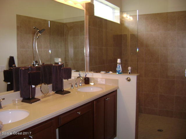 7160 Ralston Street Melbourne, FL 32940 - Photo 6 of 21 master bath walk in shower